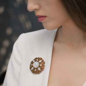 Round Brooch with Opal Coloured Stone Settings