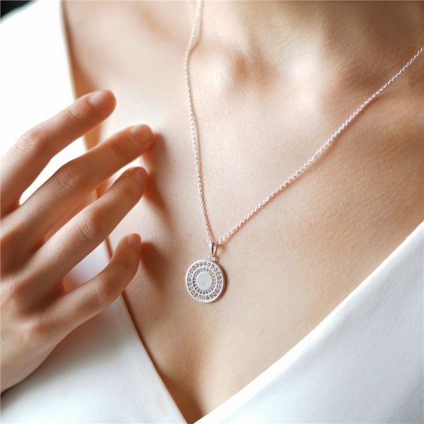 Circular Pendant with Clear Stones