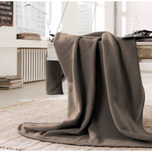 A plain taupe blanket measuring 200 x 150, a perfect match for your sofa or bed which is also available in other colours.