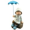 Boy on Log with Blue Umbrella