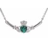 silver claddagh pendant with green diamond